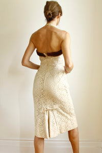 <img  src="vintage wiggle dress"  alt="1950's vintage lace and fur off white sleeveless wiggle bridal dress"