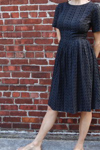<img  src="vintage eyelet dress"  alt="1950's vintage black cotton eyelet day dress"